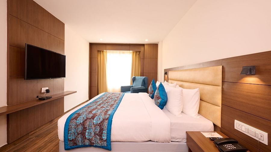 bedroom with television and telephone 