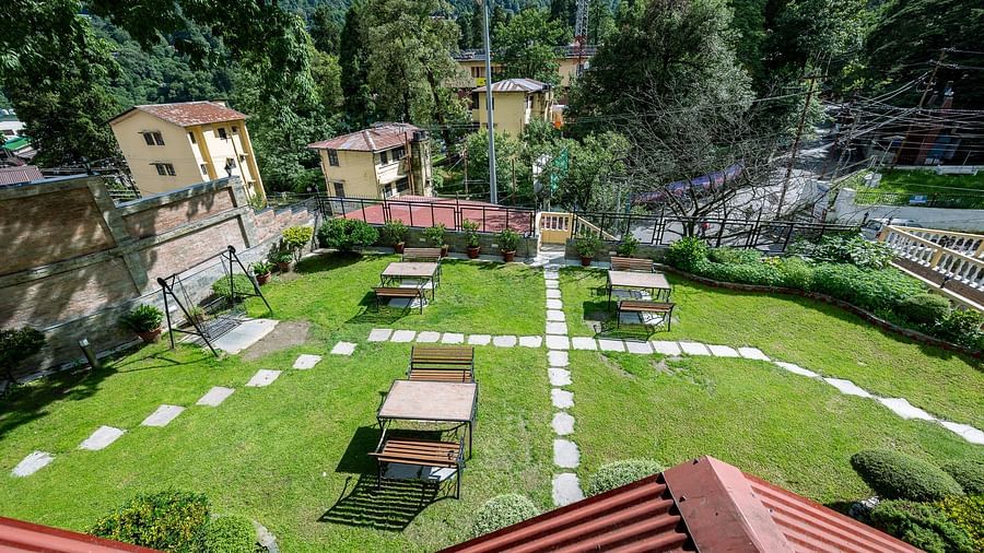 Outdoor garden seating arrangements at The Pavilion, Nainital