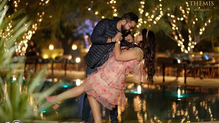 A couple dancing by the pool at Themis Mudhouse - A Nature's Retreat Resort & Wellnesss