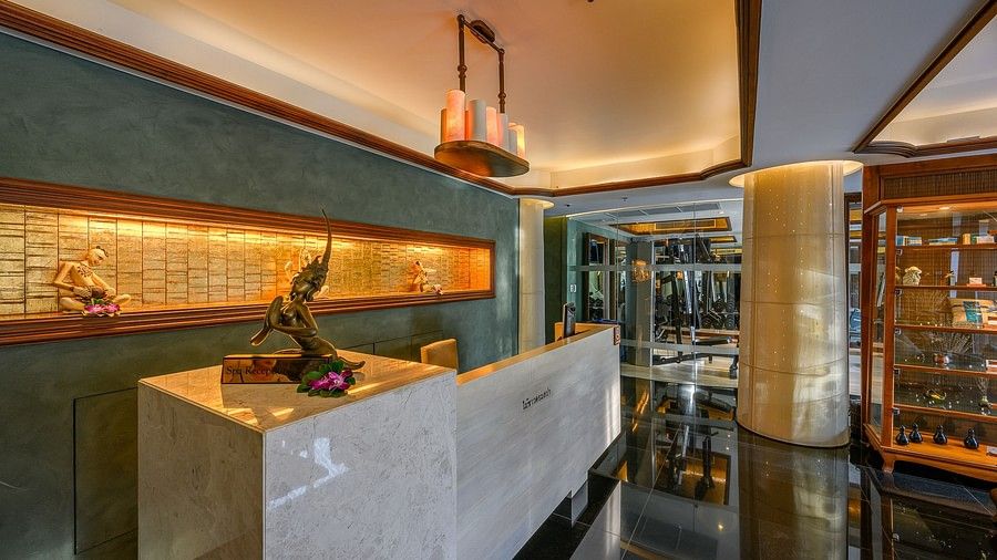 image of the reception desk with modern interiors at the Maikhao Dream spa in phuket