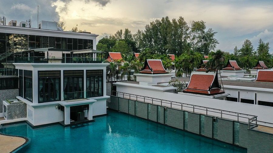 an image of the swimming pool on an evening taken from a higher level - Maikhao Dream Villa Resort & Spa, Phuket