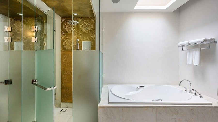 image of the bathroom featuring an expansive Jacuzzi - three bedroom private pool villa