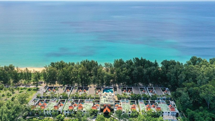 aerial image of the resort with vast blue sea stretching endlessly to the horizon