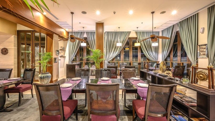 image featuring a six seater dining table in a brightly lit indoor space - Maikhao Dream Villa Resort & Spa, Phuket