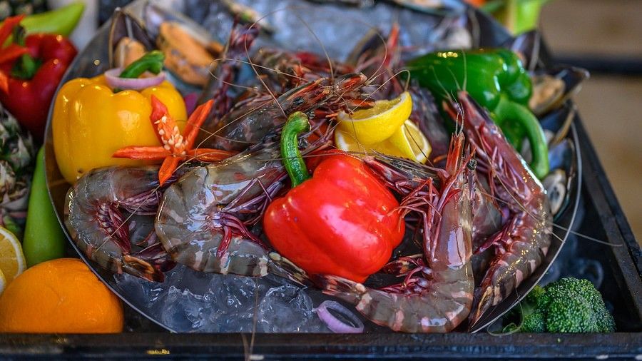 image of an exotic seafood platter with capsicum served at Maikhao dream villa resort and spa, phuket