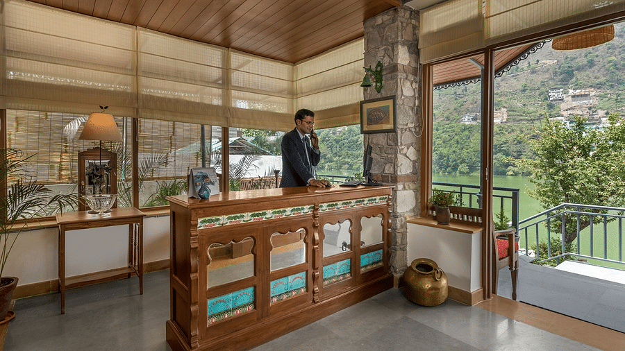 Reception area at Fishermen's Lodge, Bhimtal, featuring a welcoming ambiance and friendly staff ready to assist guests.