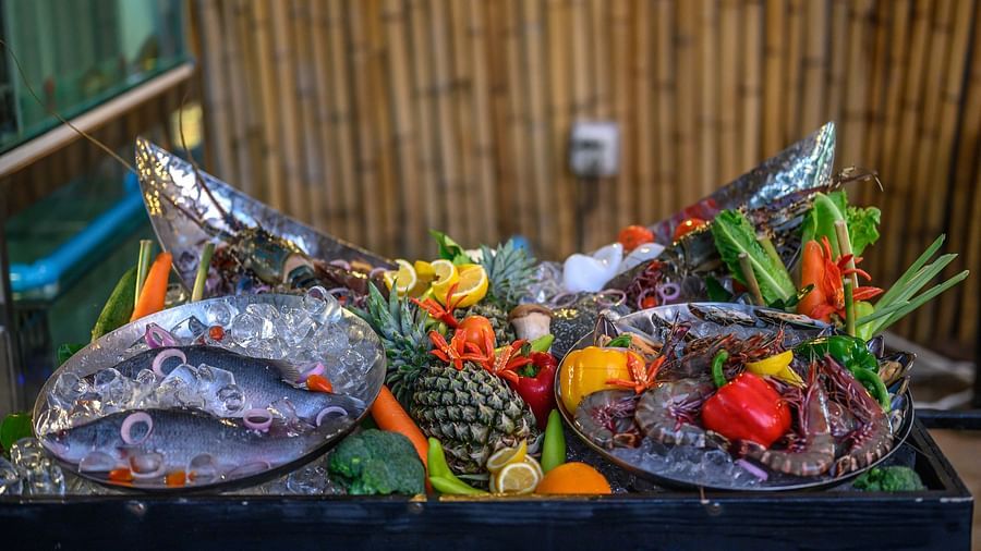 A seafood platter with a variety of aquatic life in the plates - Maikhao Dream Villa Resort & Spa, Phuket