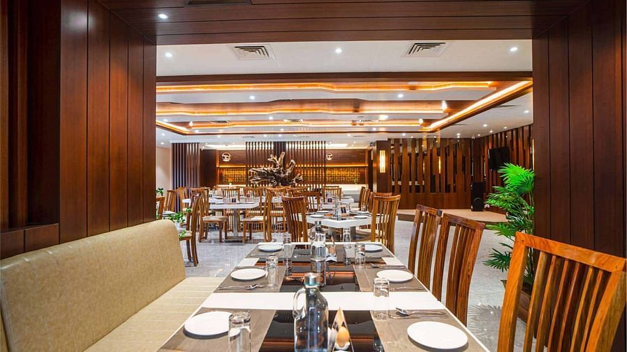 A neatly set table in the dining area of Mansha Palace in Port Blair is ready for guests.