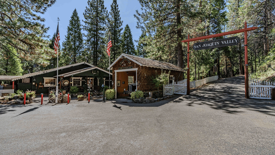Exteriors of some of some cabins at Narrow Gauge Inn during the day.