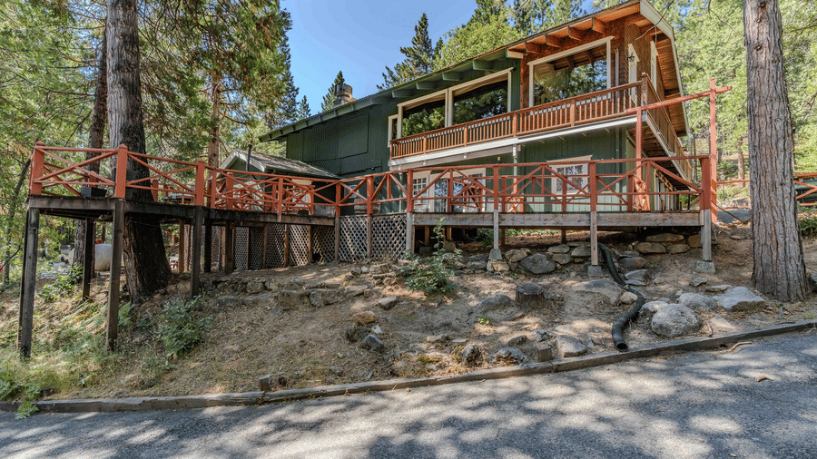 A paved road leading to a cabin at Narrow Gauge Inn.