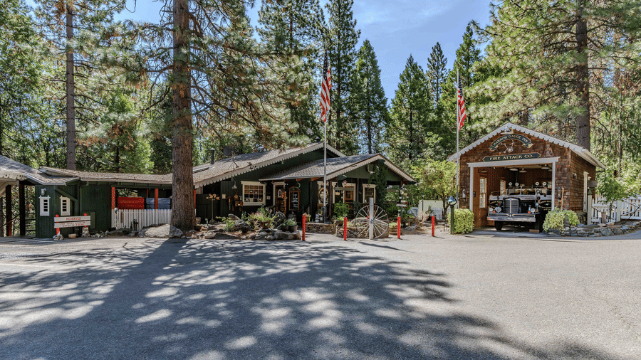Exteriors of some of some cabins at Narrow Gauge Inn during the day.