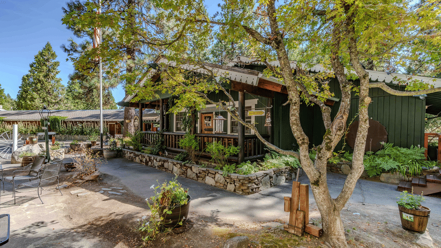 Exteriors of some of the cabins at Narrow Gauge Inn during the day.