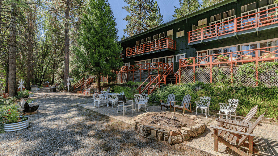 Seating in front of the facade of Narrow Gauge Inn.