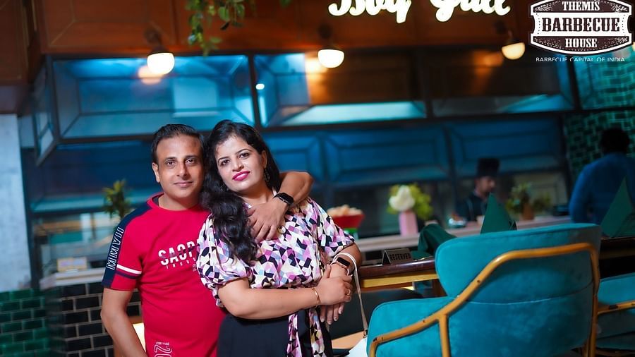 An image of a couple posing at Barbecue grill in Themis Barbecue House, Panipat