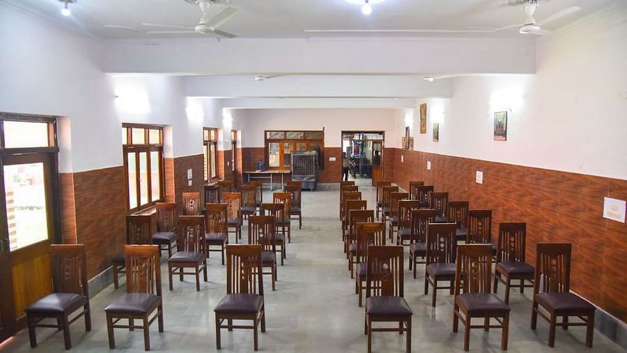Meeting hall at Goverdhan Hotel with chairs lined up