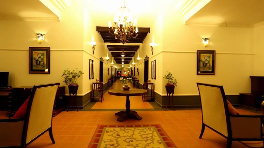 Hallway in warm lighting at this Wayanad Resort