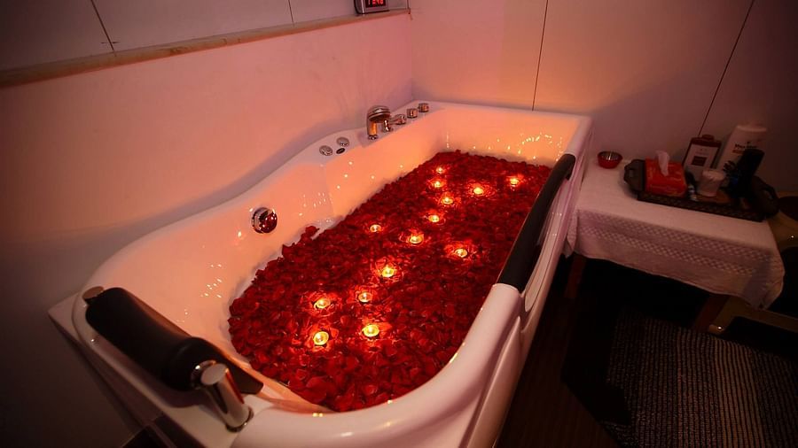 the jacuzzi filled with rose petals at the spa in Chennai at Raj Park Hotel, Chennai