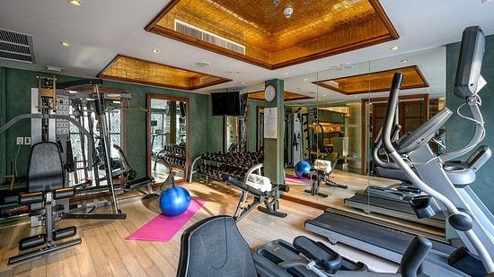full view image of the fitness centre with several fitness equipment - Maikhao Dream Villa Resort & Spa, Phuket