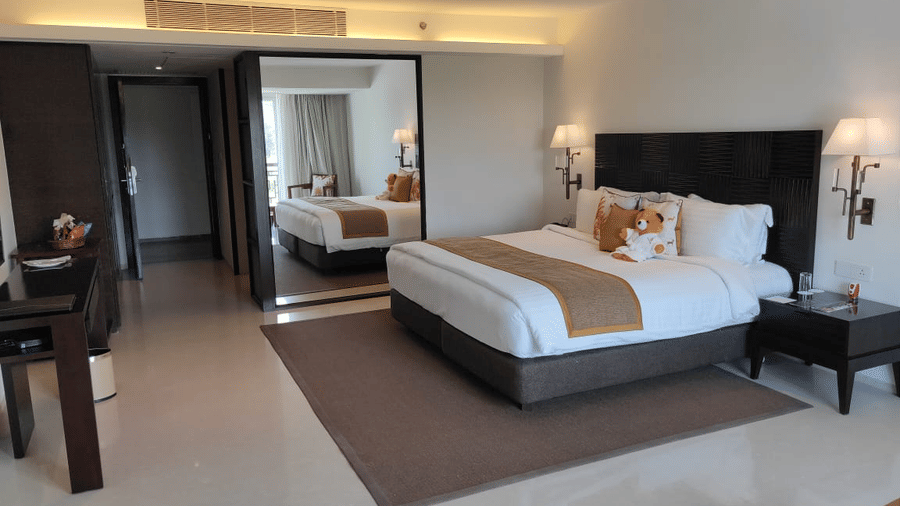 Room at The Mansion House featuring elegant interiors, cosy bedding, modern furnishings and thoughtfully curated amenities, offering a relaxing and memorable stay in a refined setting.