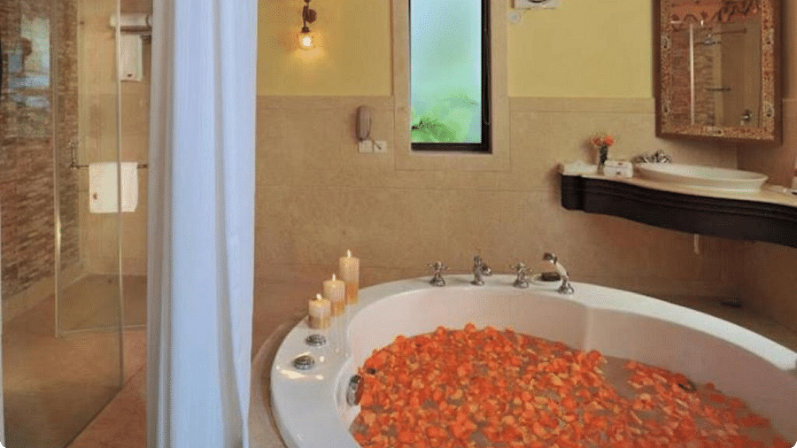 Image of a jacuzzi filled with flower petals at Rajasthali Resort & Spa Jaipur.