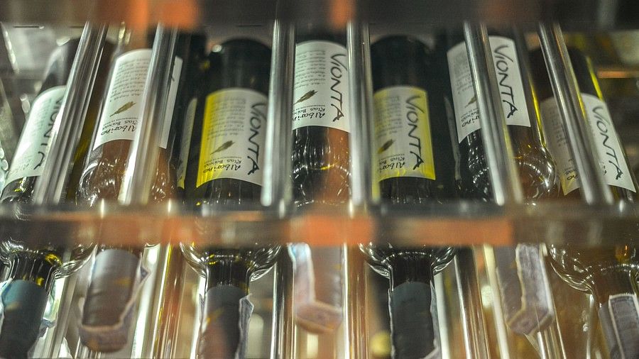image of several wine bottles at the wine cellar - Maikhao Dream Villa Resort & Spa, Phuket