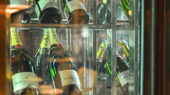 image featuring several wine bottles kept for display - Maikhao Dream Villa Resort & Spa, Phuket