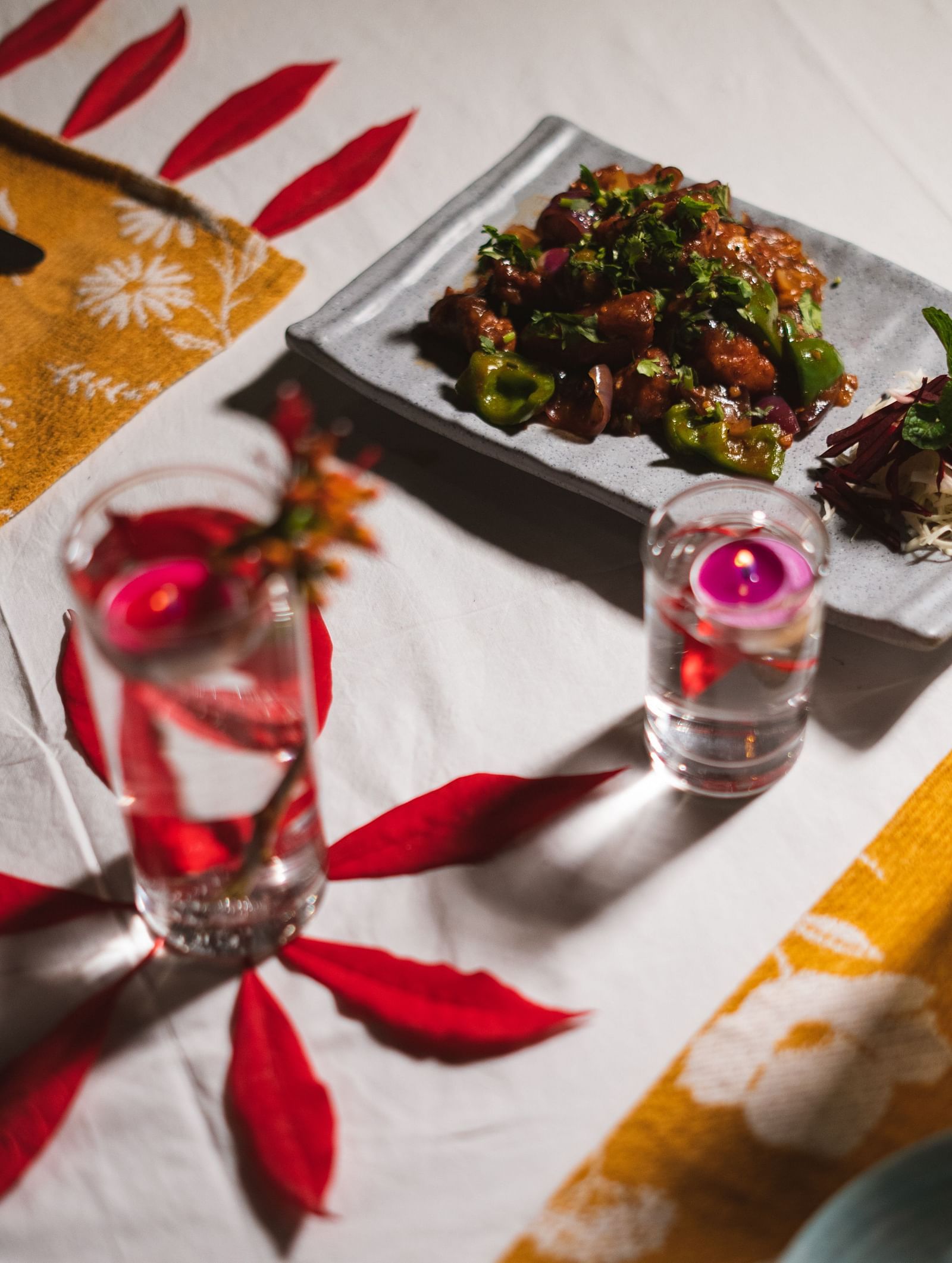 A close-up of a neatly set table with food and cutlery at BluSalzz Villas - The Green Roof, Bhimtal.