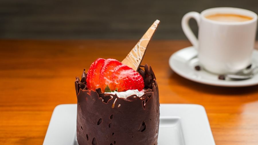 An image of a dessert made of cake presented elegantly on a white plate - S Hotel Montego Bay, Jamaica