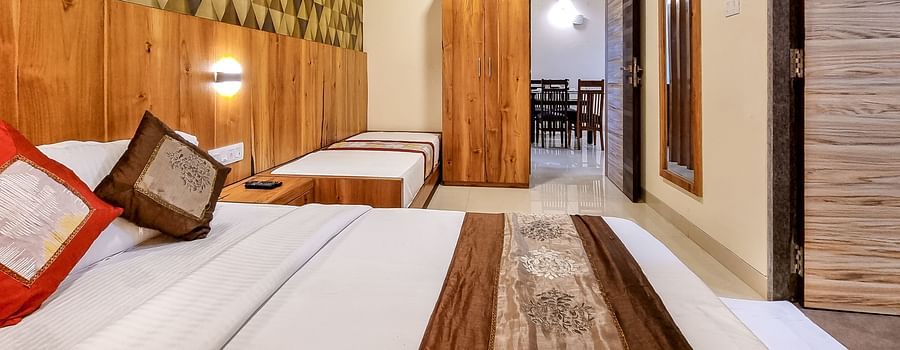 Home2 Suites & Service Apartments, Mumbai Airport - beds in one of the rooms at our 2BHK premium apartment near Mumbai Airport
