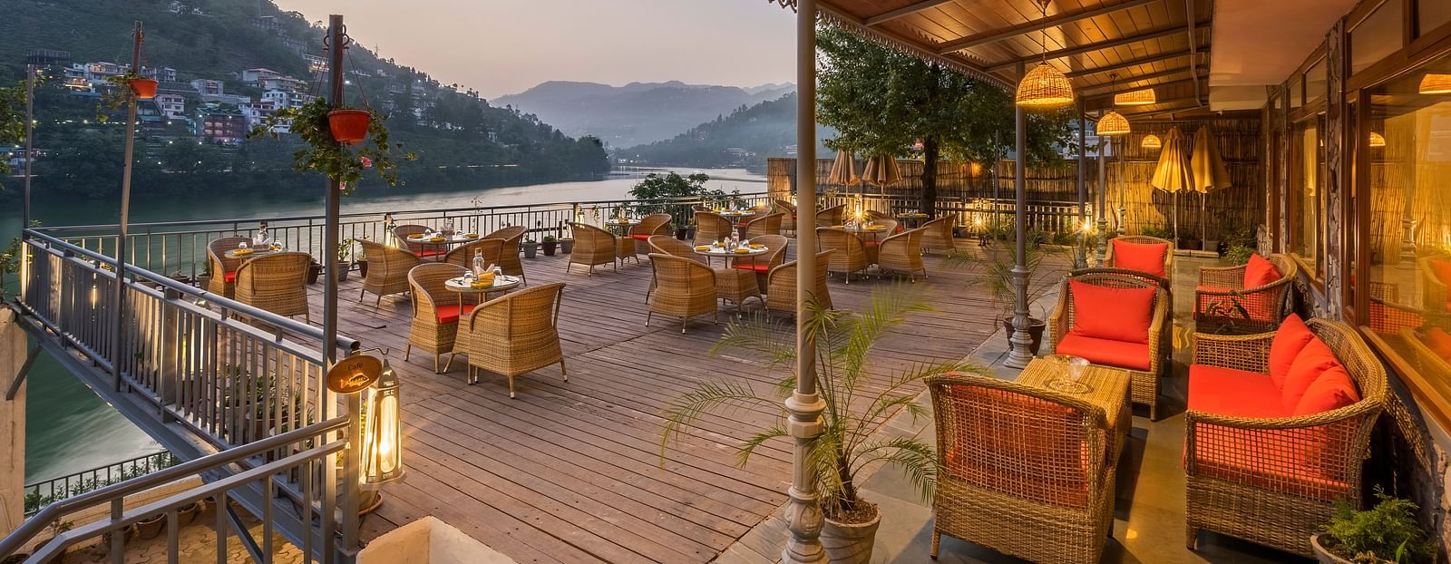 L-Attitude Deck at Fishermen's Lodge, Bhimtal, featuring a stunning view of the lake, perfect for relaxation and enjoyment.