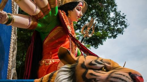 Side view of the idol of Durga Maa with a lion's head on the side in view