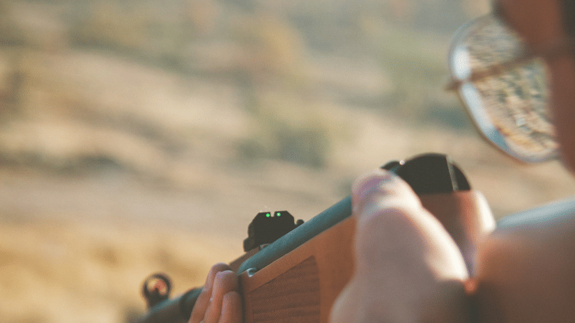 man on shooting range with a gun
