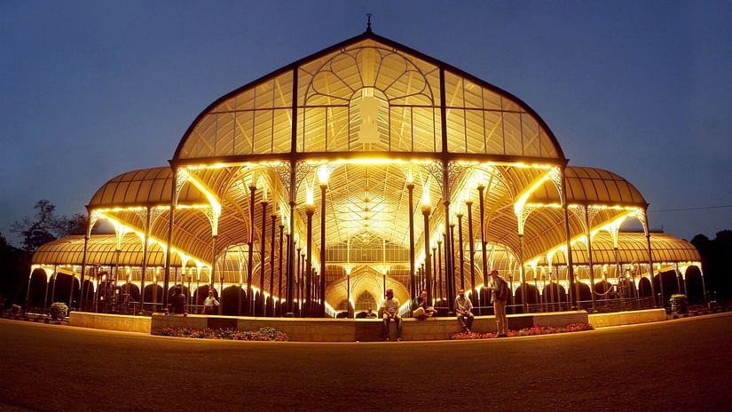 Glasshouse and fountain at lalbagh botanical garden at night