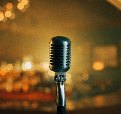 An image of a microphone on stage.