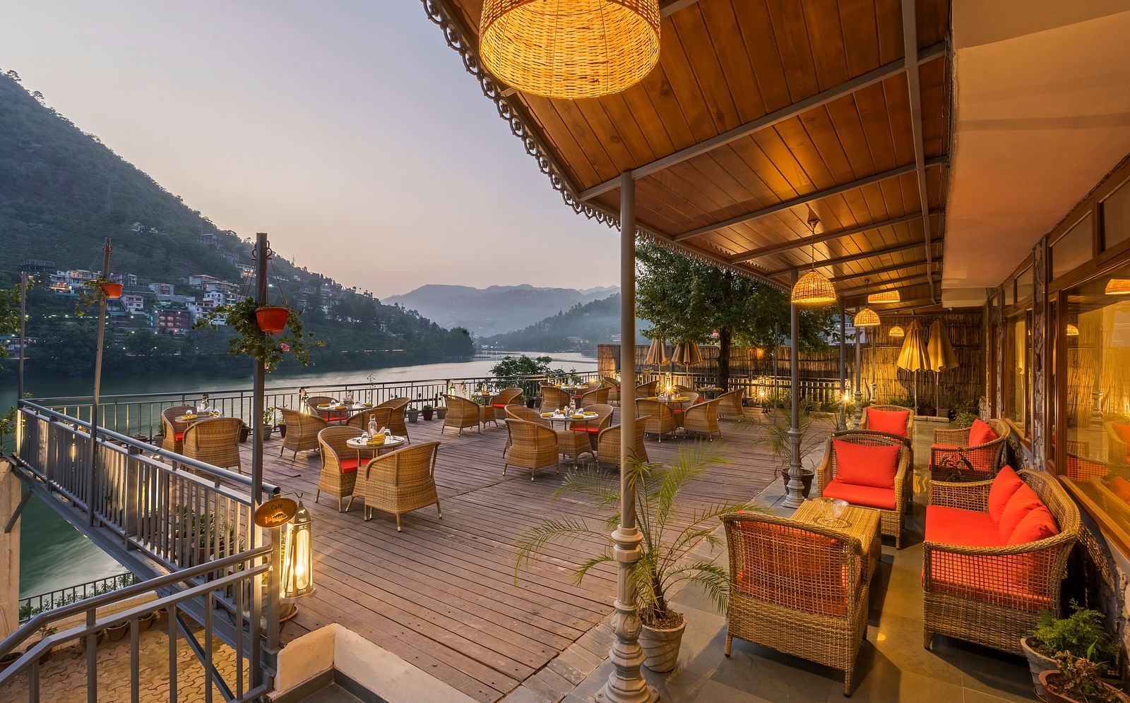 L-Attitude Deck at Fishermen's Lodge, Bhimtal, featuring a stunning view of the lake, perfect for relaxation and enjoyment.