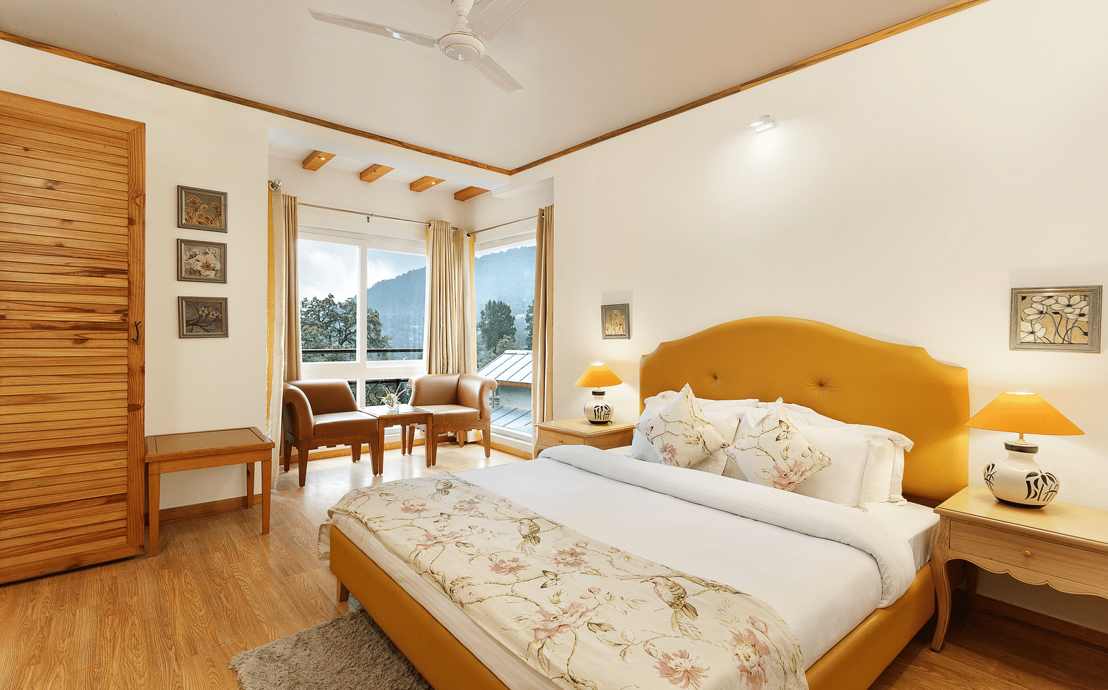 A cosy room with plushy bed, table lamp with makes the ambience homely - Pinewood Nainital 