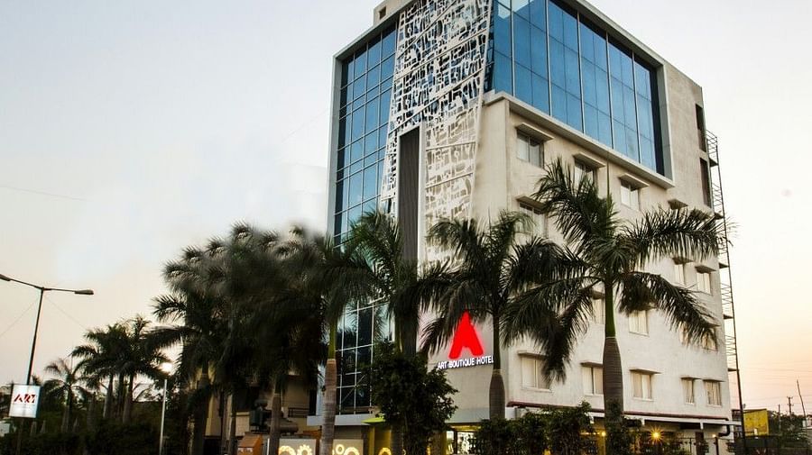 Facade of Art Boutique Hotel, Hyderabad with trees in front of it
