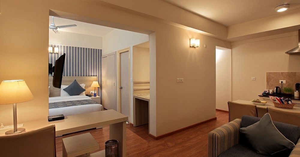 Living room area of a suite at Starlit Suites, Bangalore