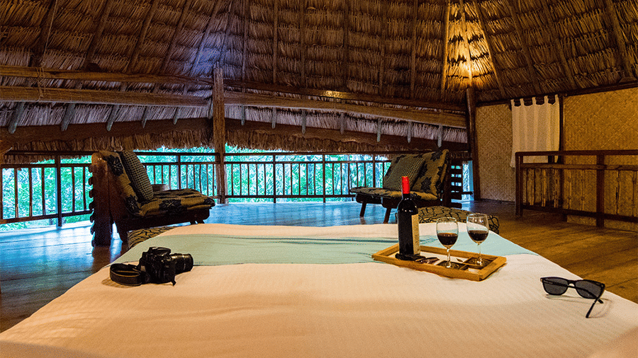 Lounging area in one of the Fan-cooled Duplex Cottages at Barefoot at Havelock.