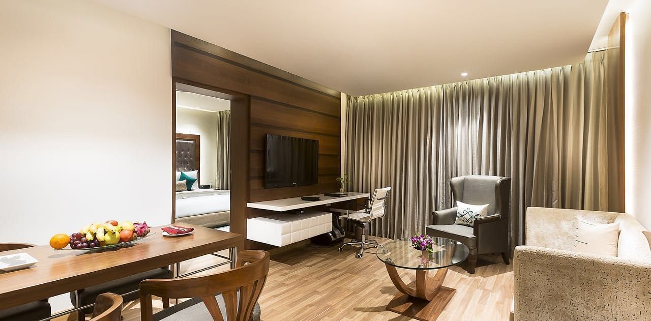Living Room of Deluxe Suite at Grand Chennai By GRT Hotels.