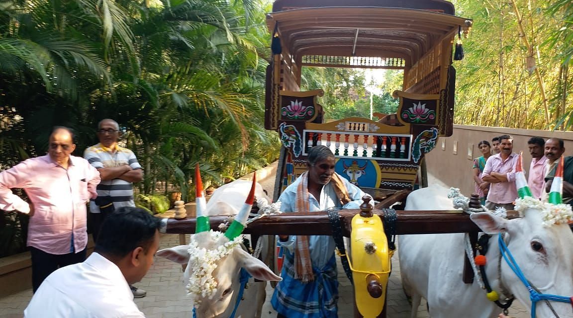 image of the bullock cart being driven across the hoysala resort premises