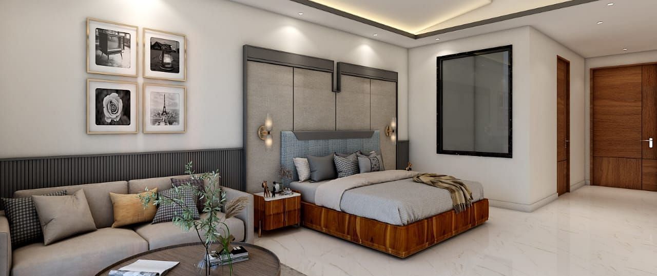 A spacious room featuring a double bed alongside a common seating area. - Namaste Corbett