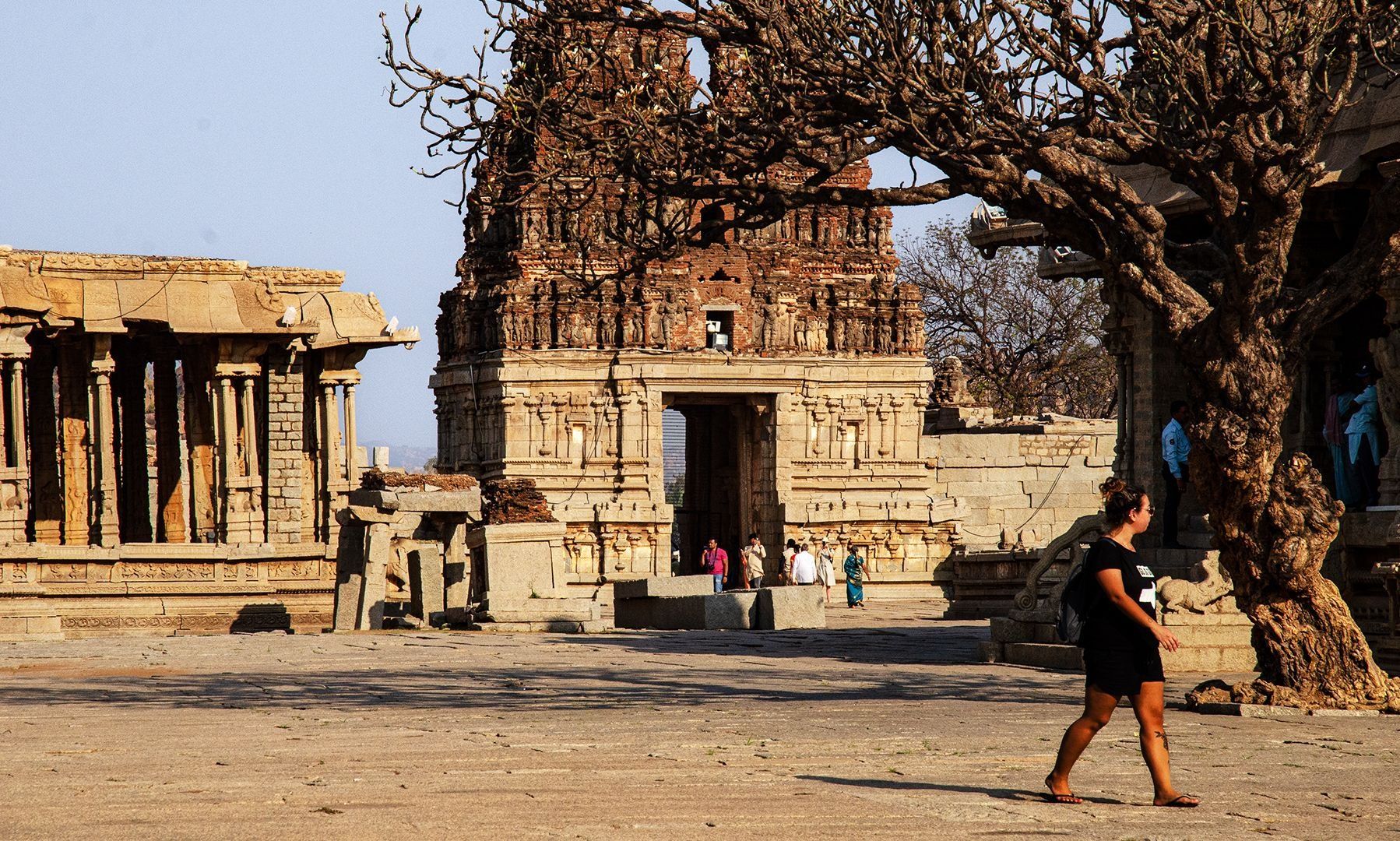 Ancient Hampi temple with intricate stone architecture.