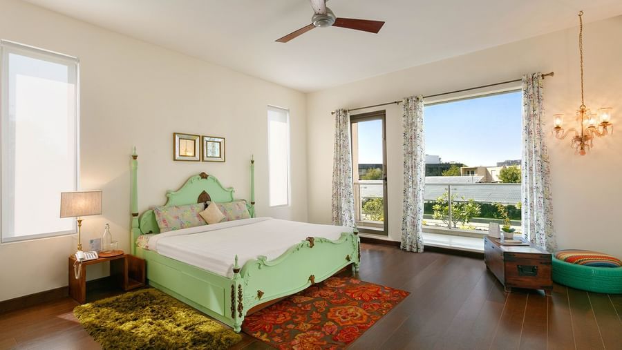 An overview of a bedroom inside Humming Bird Villa - Karma Lakelands.