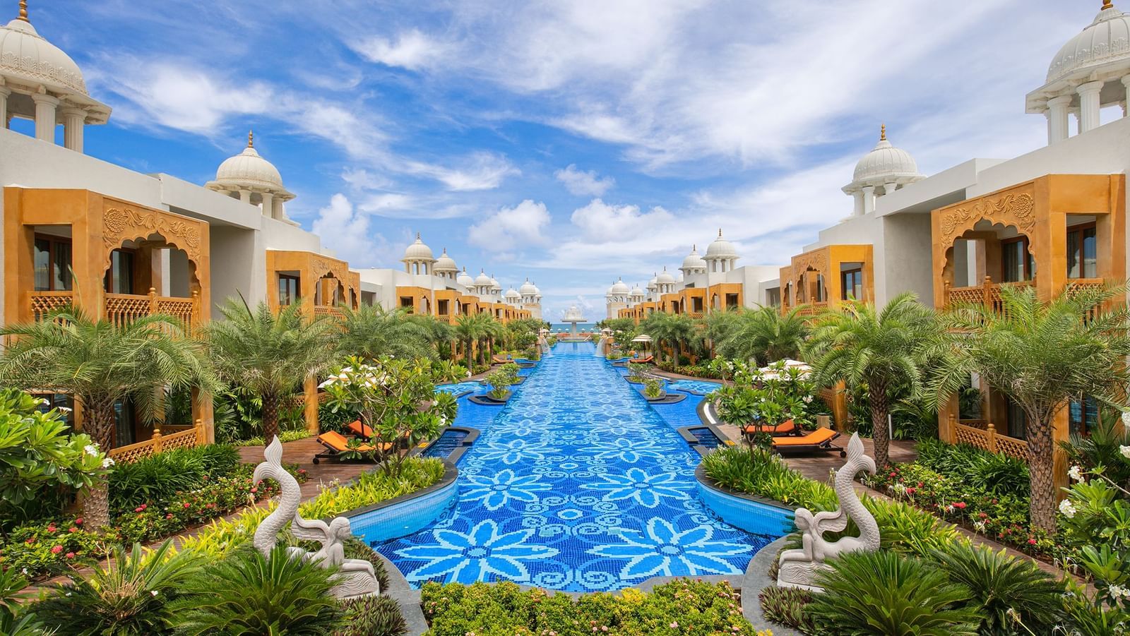 The palace pool at Kaldan Samudra Palace, surrounded by sun loungers and Rajasthani-inspired architecture on either side – Kaldan Samudra Palace, one of the finest ECR resorts with swimming pool, offering a serene and luxurious retreat