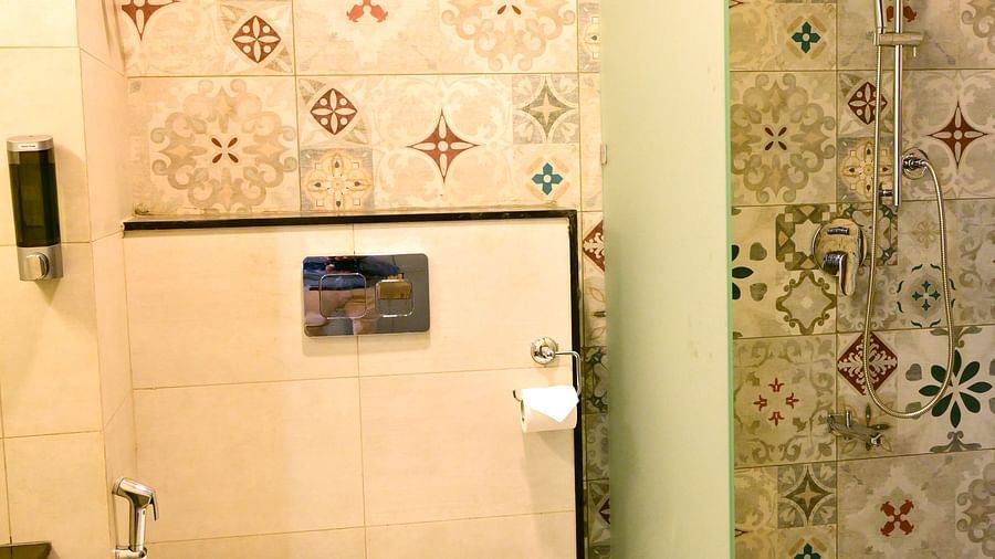 Washroom with patterned tiles and shower cubicle 2 - Clarks Inn Express, KRS Road, Mysore