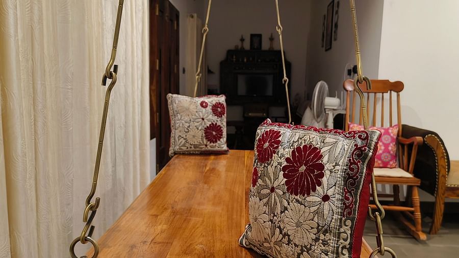 A swing with pillows in the common area at Ananda Holiday Home, Wayanad 2