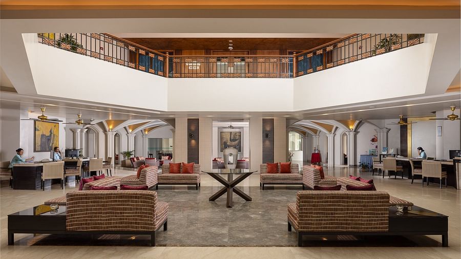 image of the lobby at kenilworth spa and resort, goa with ample of seating arrangements