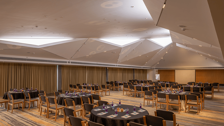 A cluster seating arrangement at Pavillion Hall of Keniworth Resort & Spa for a corporate offsite in Goa