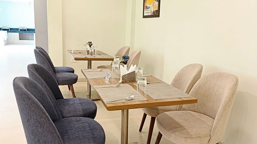 Seating arrangement inside the restaurant 5 - Starlit Suites, Shirdi